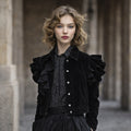 Woman wearing black velvet gothic jacket